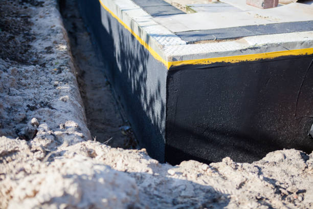 Professional Emergency Waterproofing technician working in Princeton, IN